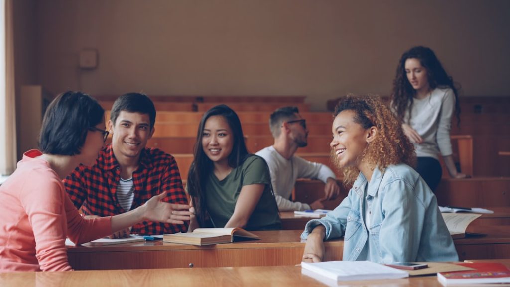 Students learning together in a lecture hall