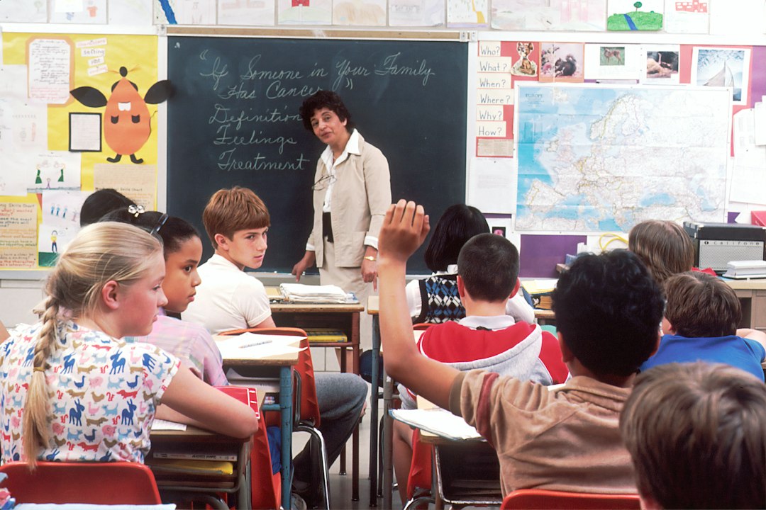 Students attending a classroom lecture